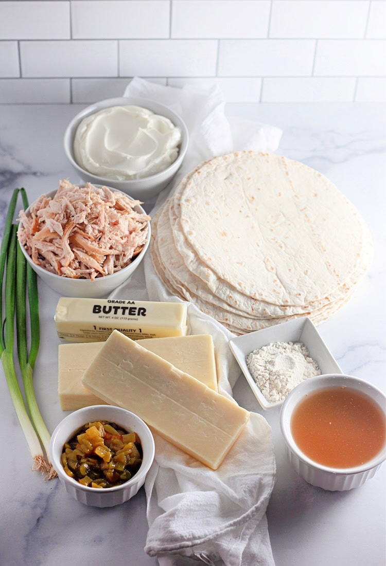 This Chicken Enchiladas Suizas recipe is one of the best enchiladas you'll ever try. It's easy and so yummy!