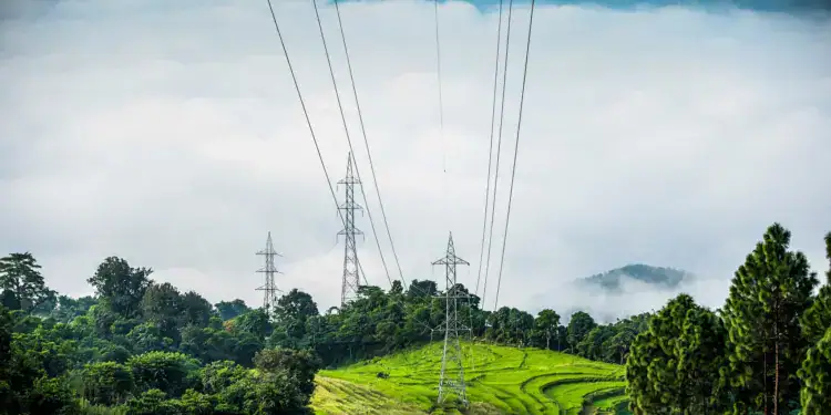 High-voltage transmission towers carrying hydropower