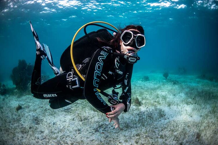 a diver underwater during her ssi advanced course