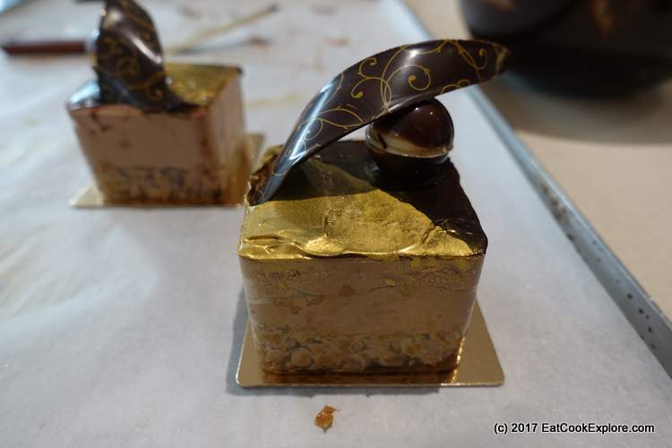 Valrhona Pave Royal filled with chocolate mousse with a crispy feuilletine nutella base