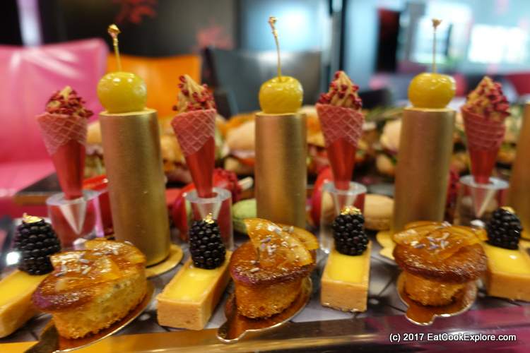 Cake Boy Afternoon Tea mini berry waffle cones with burnt white chocolate ganache, orange and lavender friand and the rather stunning wild berry magnum which is filled with berry mousse. 