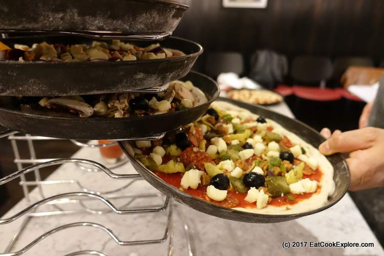 Pizzas Stacked ready for the oven