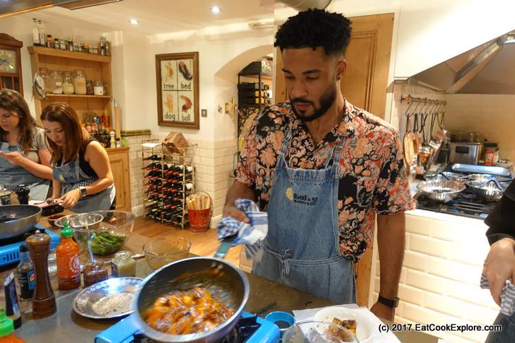honey sriracha Hugo cooking the chicken