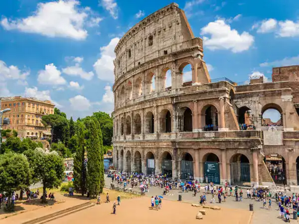 Colosseum in Rome at sunset as featured in our Europe Tour Package