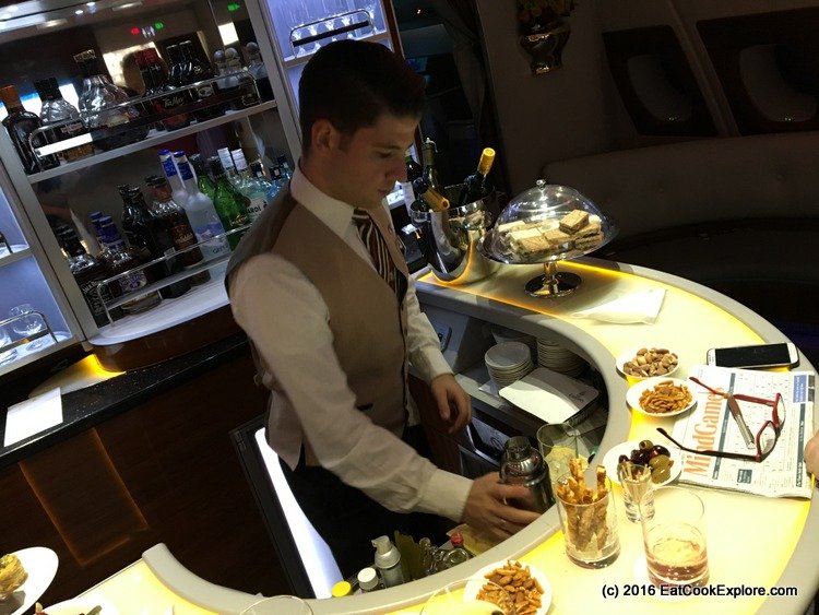 Cesar the Steward manning the Sky Bar Cesar the Steward manning the Sky Bar in Emirates Business Class