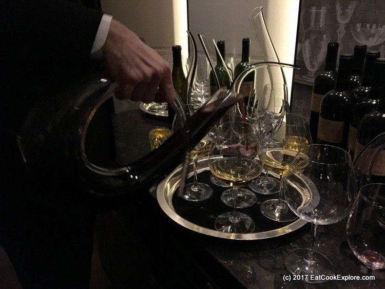Pouring the Chairman's Reserve wine from Grace Estates