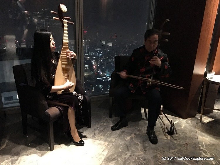 Ting Serenaded by traditional Chinese music