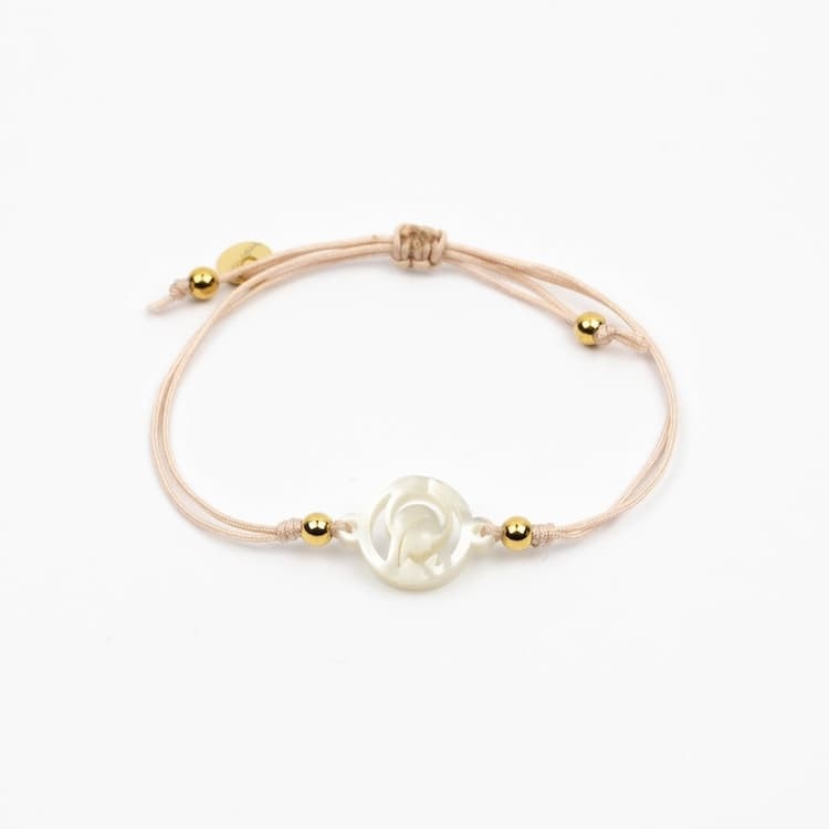 virgen nina pulsera cubitos nude