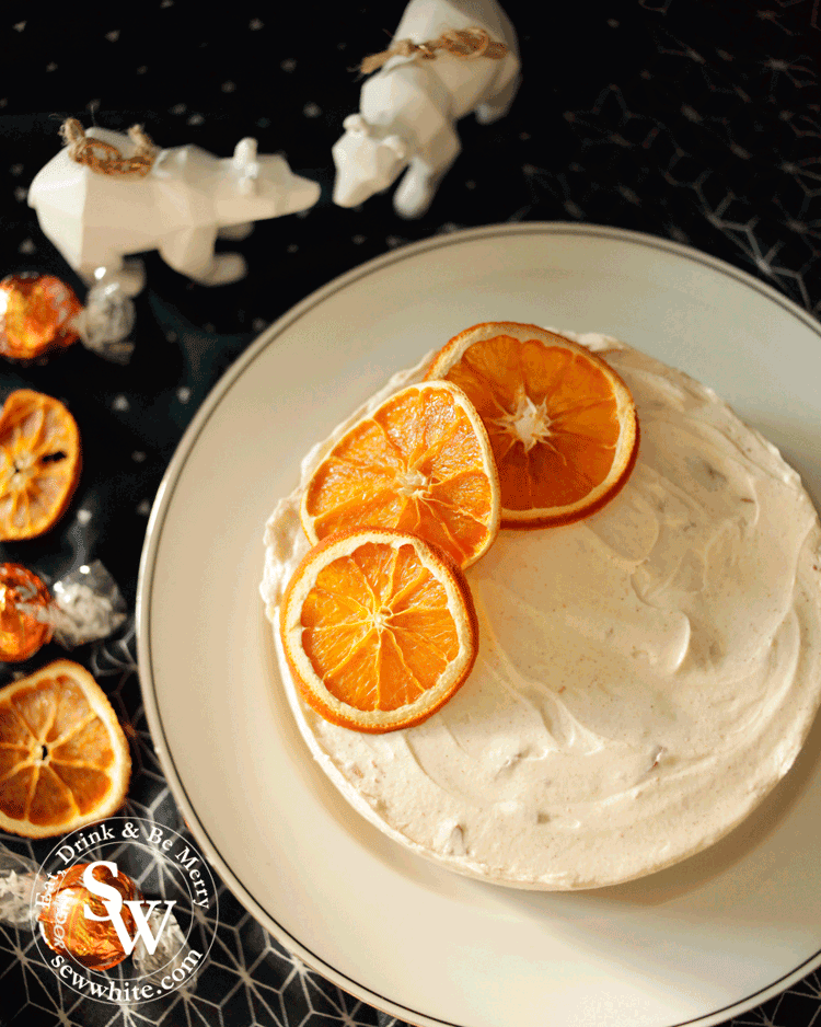 orange and cinnamon christmas cheesecake topped with dried orange slices