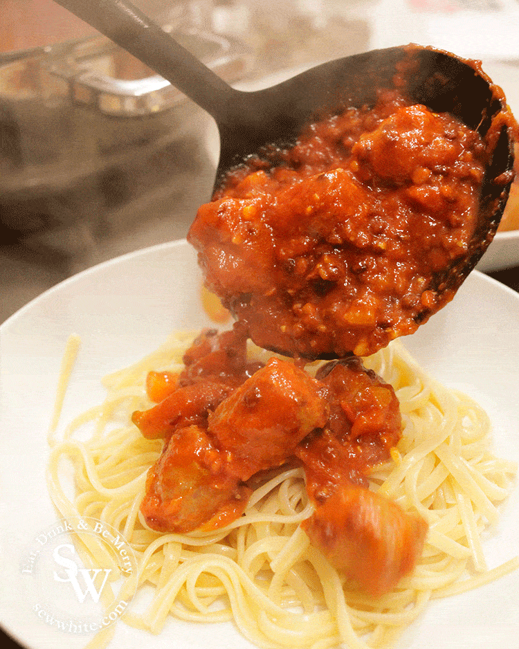 freshly served Sausage and lentil pasta. Lentil in the rich tomato sauce.