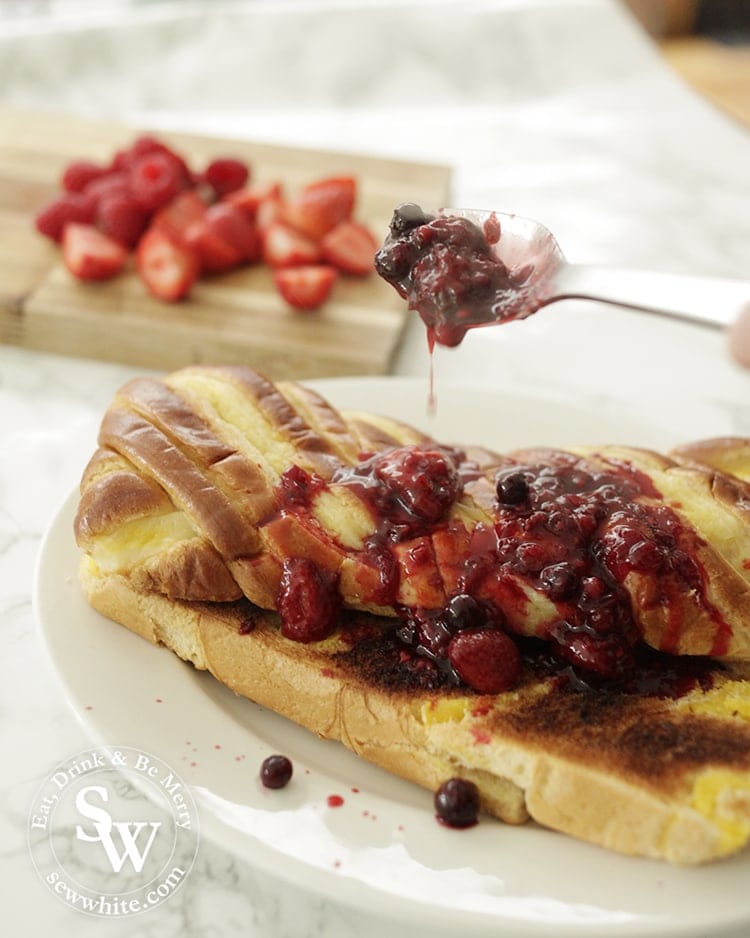 Brioche Bread covered with hot fruit compote