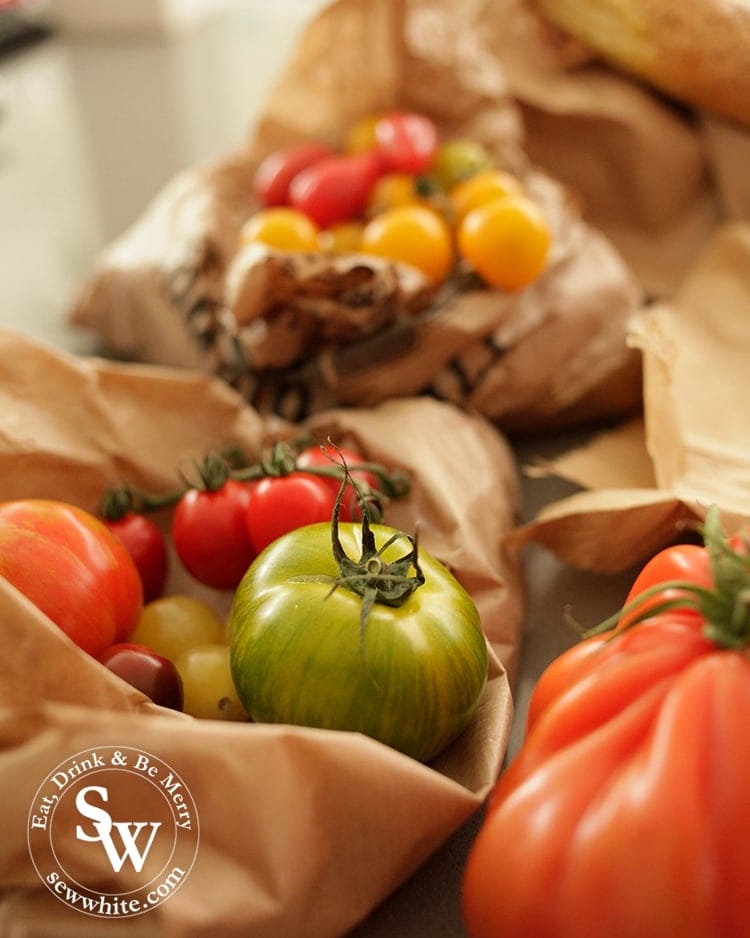 tomatoes in a brown paper bag in the Top Gifts for Food Bloggers round up