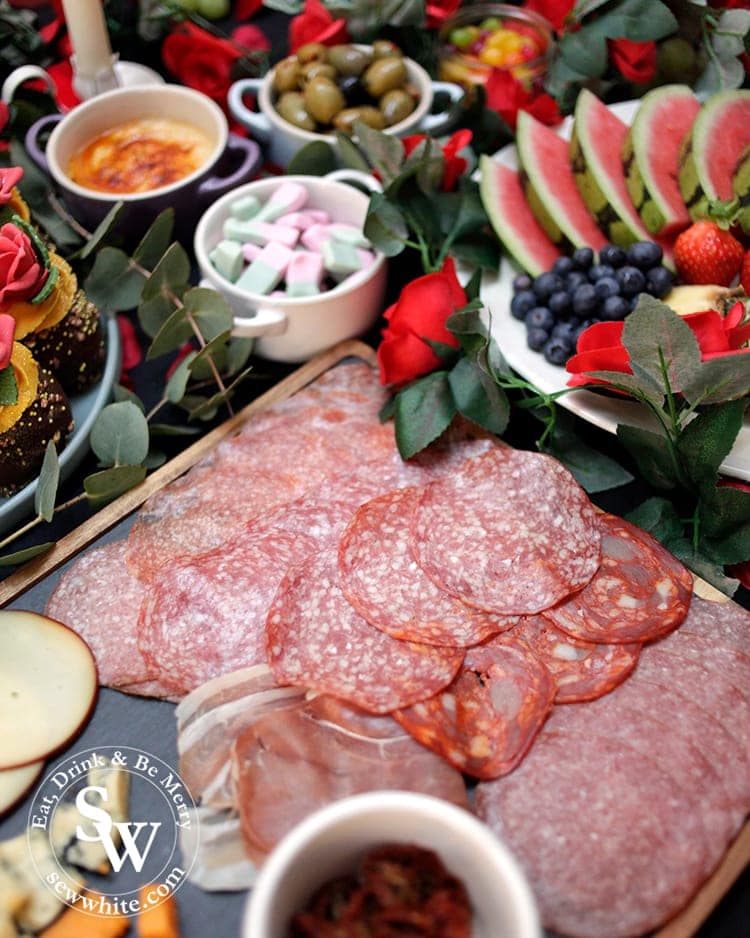 A close up of the charcuterie board on the graze table and the graze board.