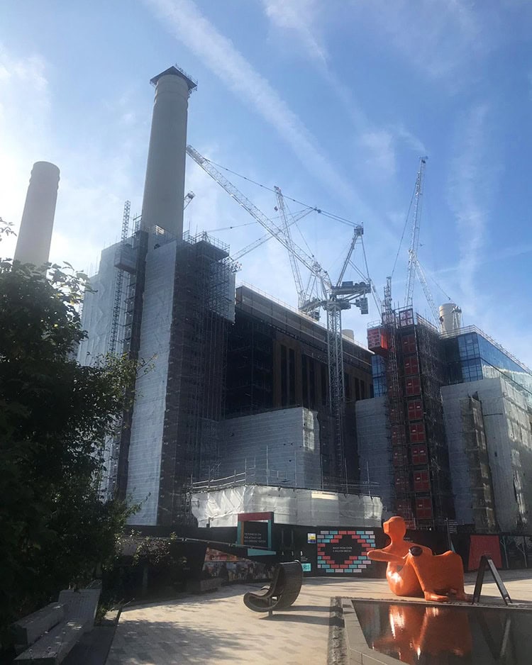 Battersea Power Station nearing completion on a beautiful sunny day.