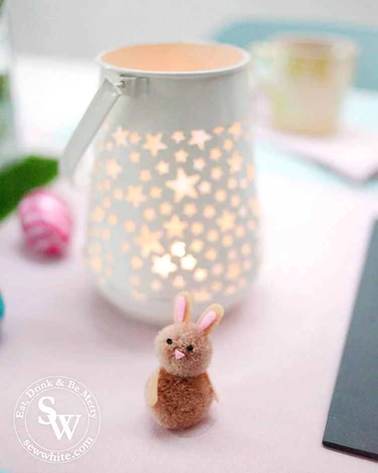 white star lanterns with pom pom Easter rabbits on the Easter Table Inspiration