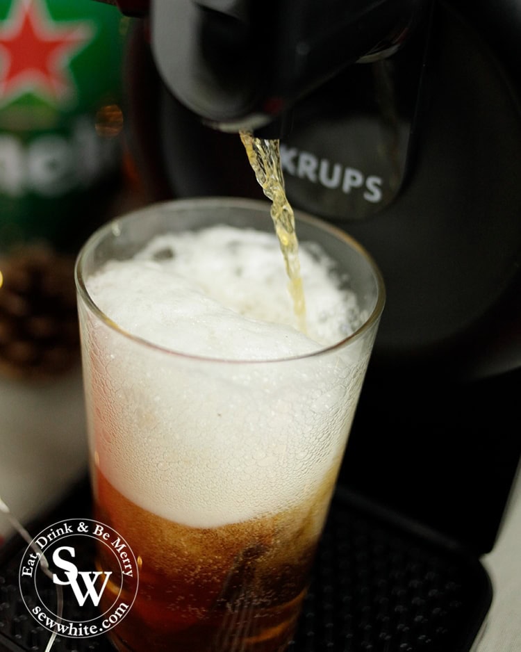 Beer being poured from the sub machine beer tap in the Top 5 Drinks for Christmas 2019