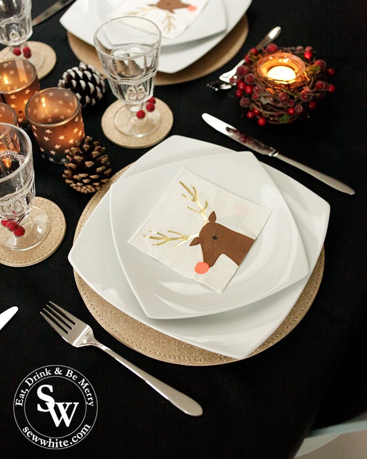 black gold white with red Christmas table setting with Viners Eden set cutlery