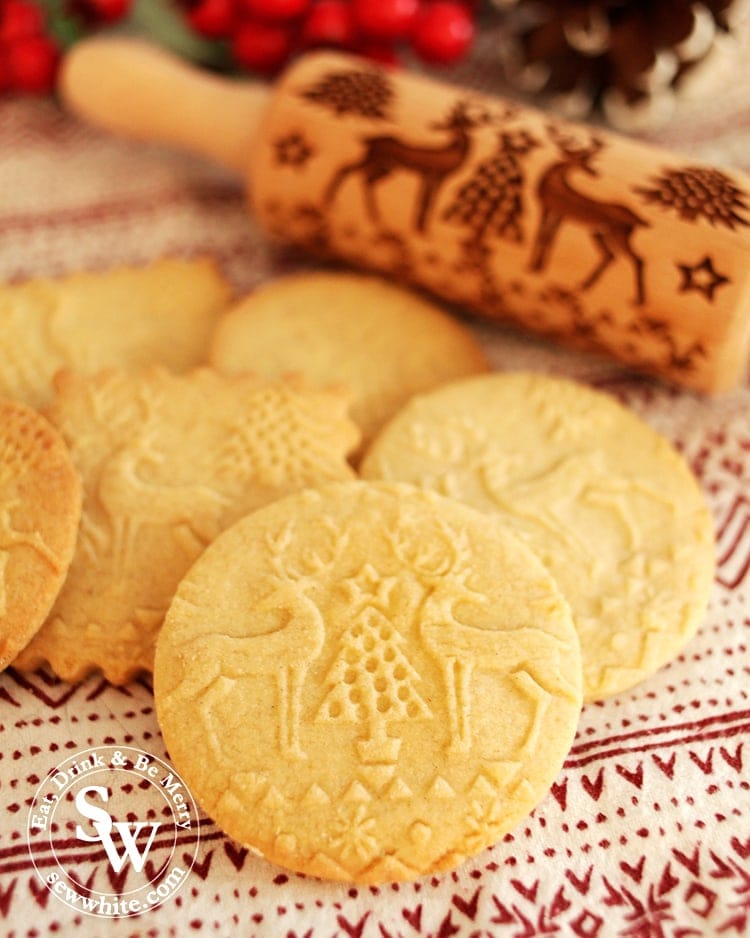 Embossed Rolling Pin Biscuit Recipe showing the finished biscuit with reindeer and Christmas tree