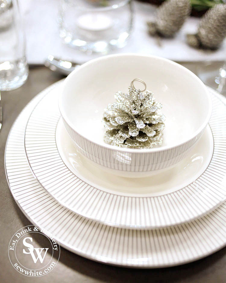 silver pine cone place setting. Silver Christmas Table Inspiration