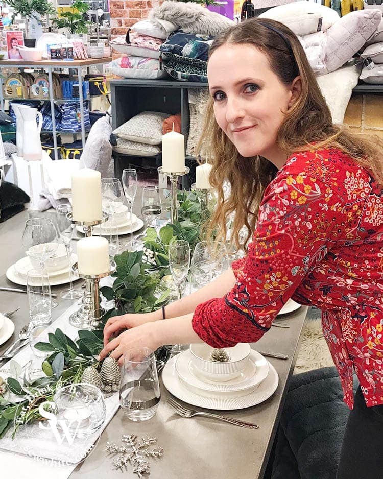 Sisley White setting the table for the Elys Wimbledon Stlye mag photoshoot for christmas 2019. 