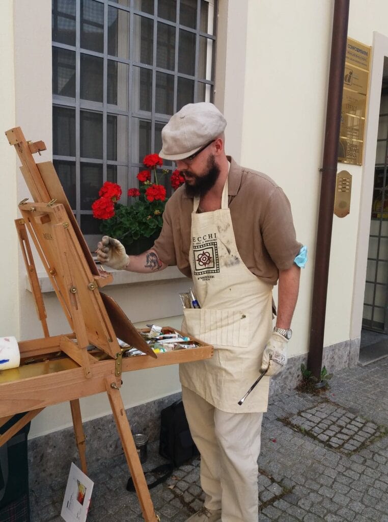 Andrea Bocedi painting outdoors in Monza, Lombardy, during a plein air oil painting session near San Gerardino church