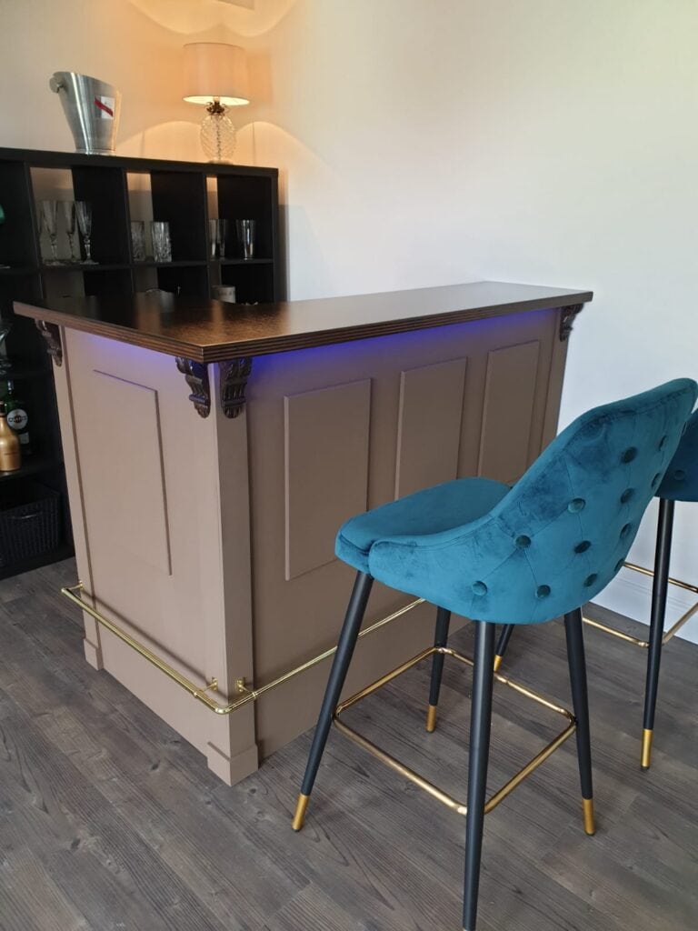 The Abbey bar in brown with turquoise bar stools