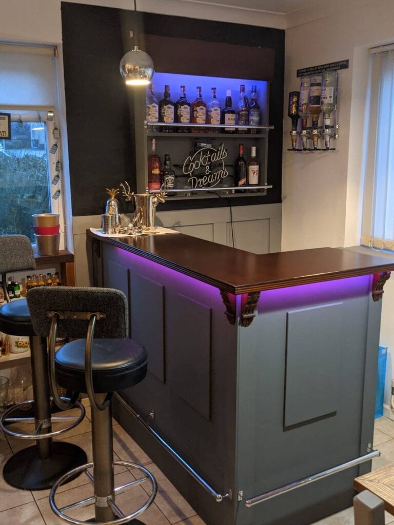 Our wall bar placed behind one of our Abbey bars