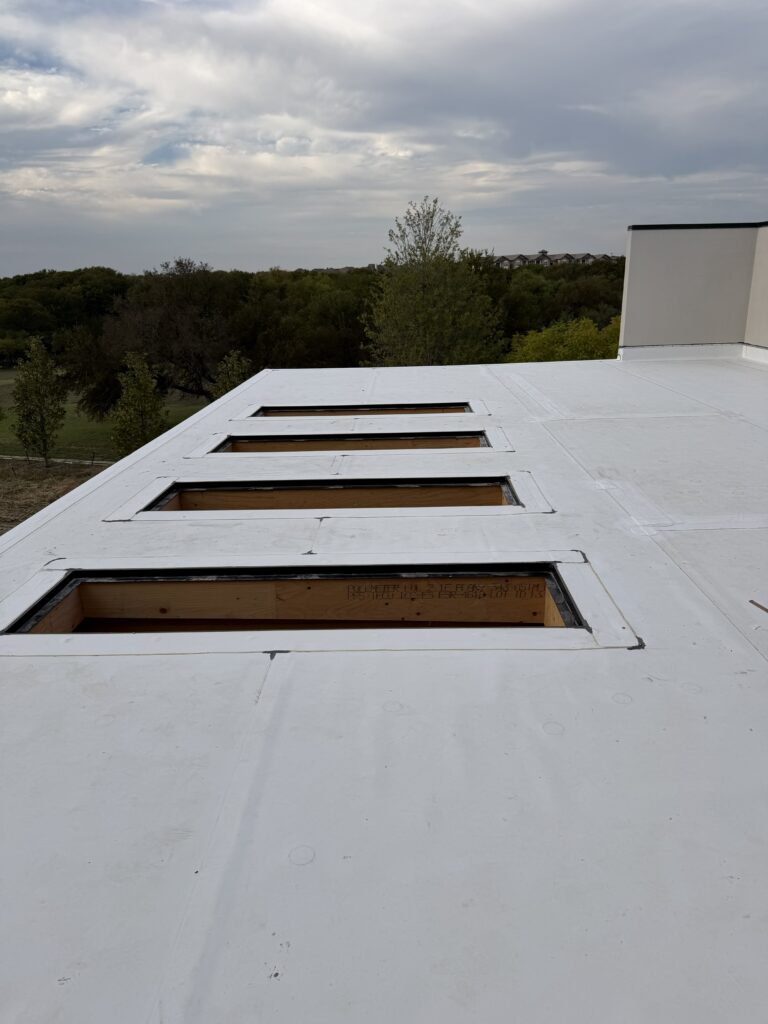 TPO commercial roof with skylight framing installation in Weatherford, TX completed by JDCC Roofing