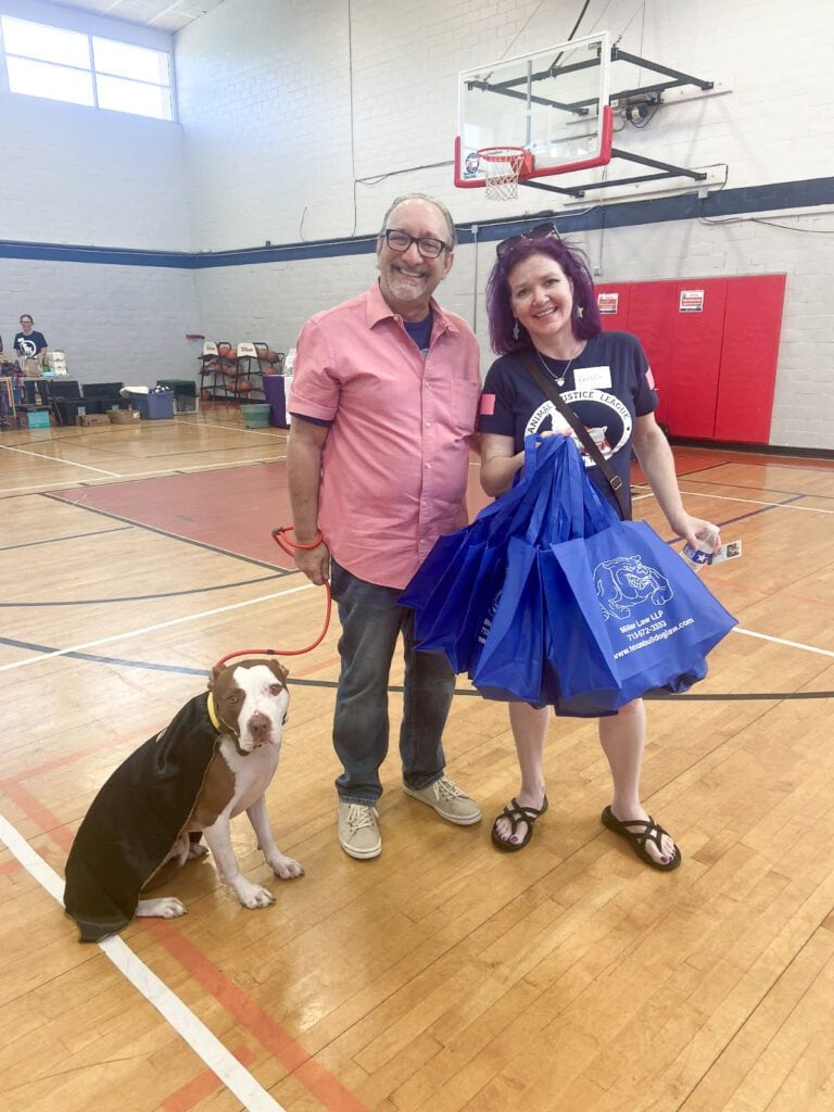 Adam H. Miller and McLovin at Animal Justice League Pet Wellness Fair supporting Houston animal welfare
