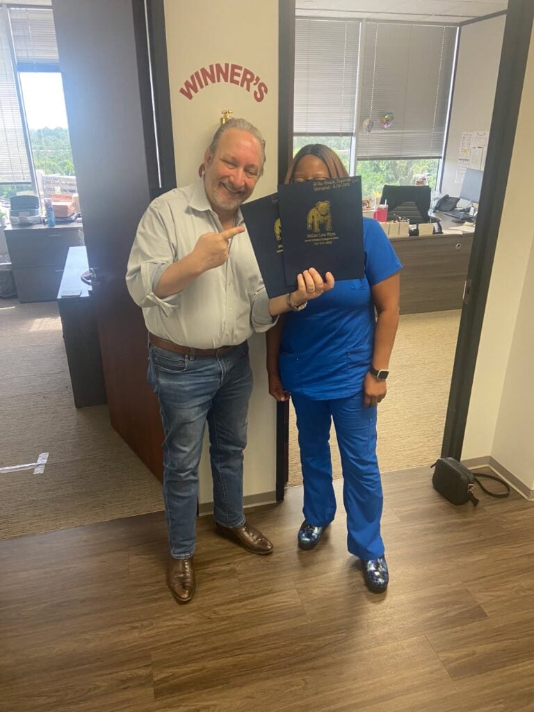 Client celebrates personal injury case win at The Miller Law Firm – The Texas Bulldog.