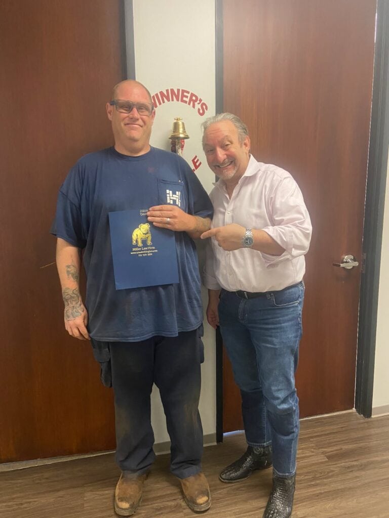 Houston personal injury victory celebrated with The Texas Bulldog Law team.