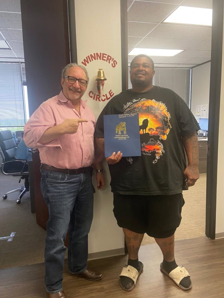 Winner’s Circle celebration photo from The Texas Bulldog Law Firm in Houston.