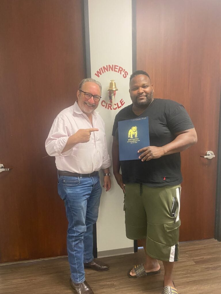 Personal injury client ringing bell after successful settlement