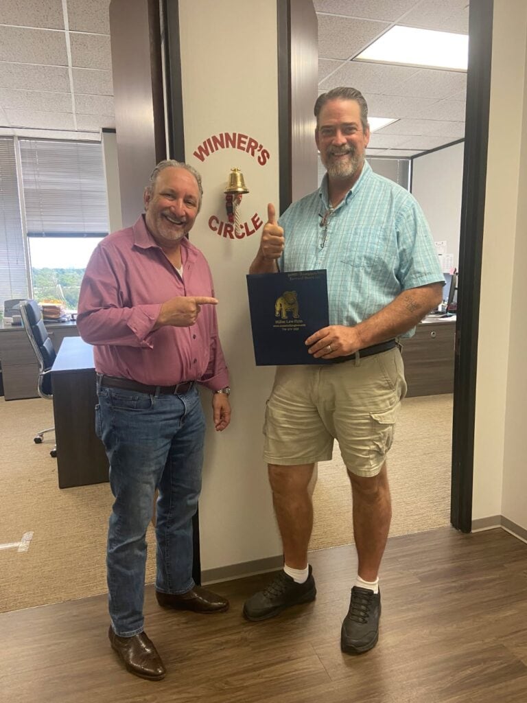 Houston car accident client celebrating settlement victory