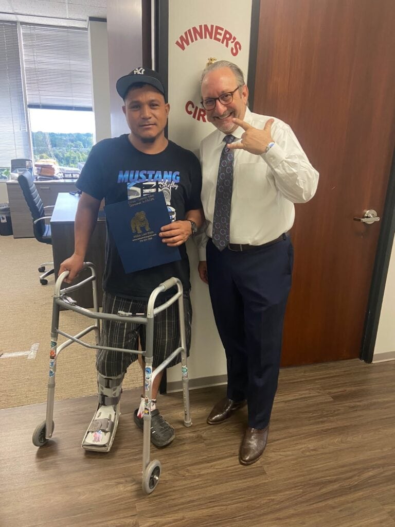 Houston injury client celebrating compensation after accident