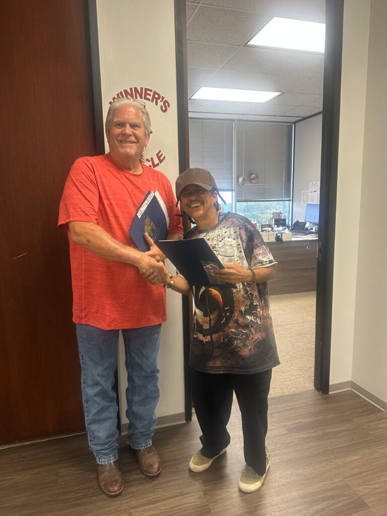 Injury victim celebrating case result with Houston lawyer