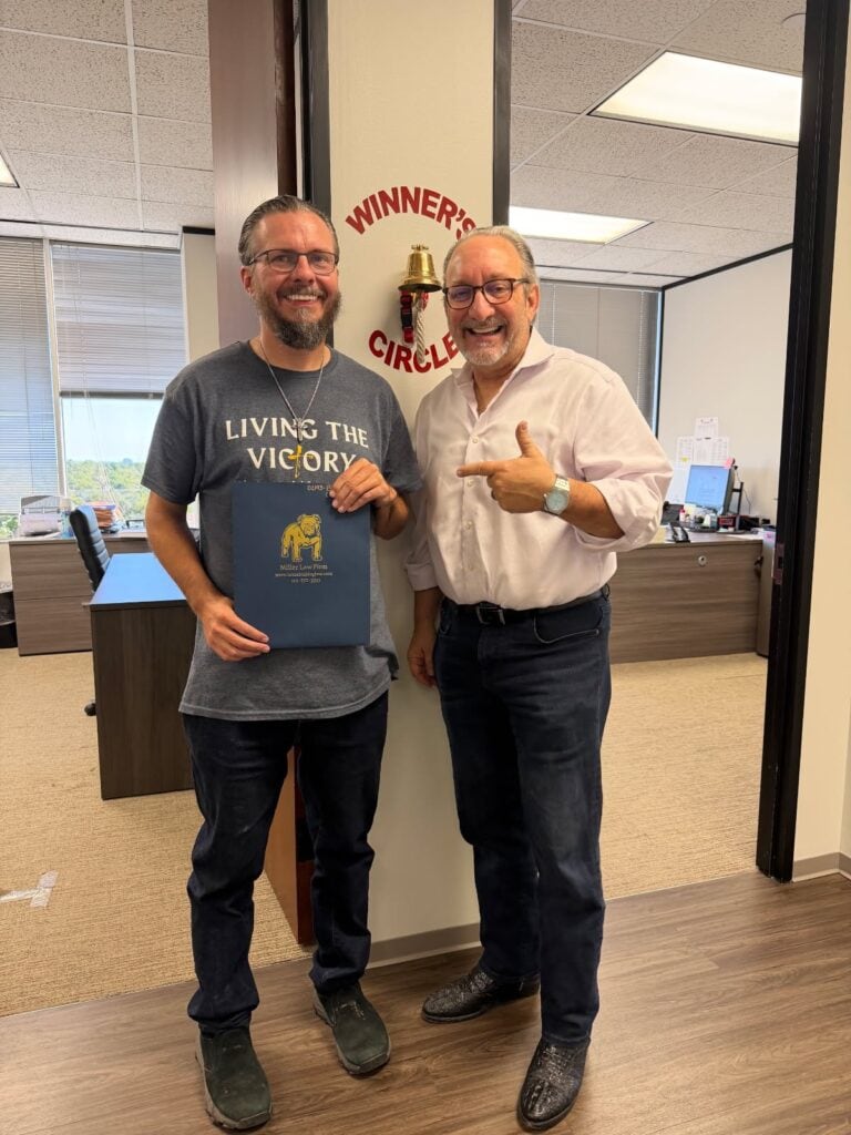 Houston injury client celebrating win with Texas Bulldog lawyer