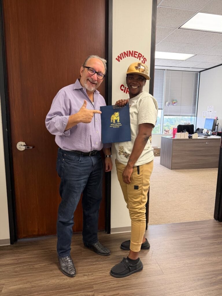 Houston client celebrating win with The Texas Bulldog team