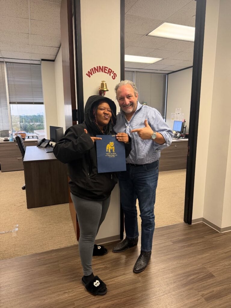 Grateful client celebrating legal victory after accident