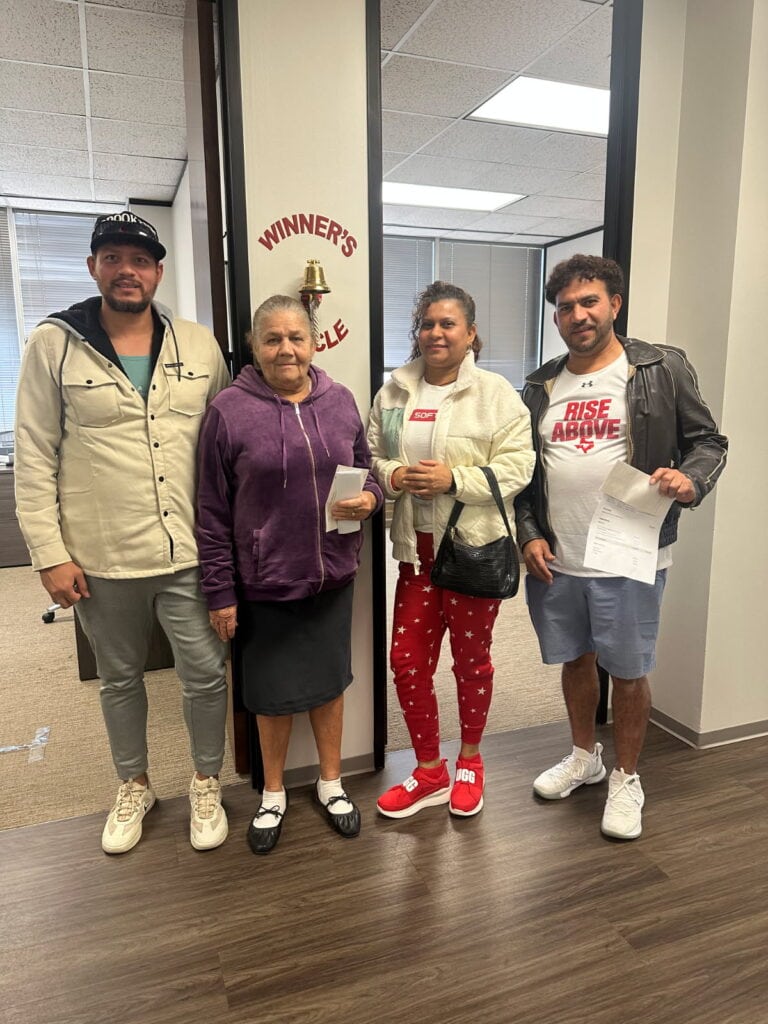 Houston injury client celebrating compensation after case