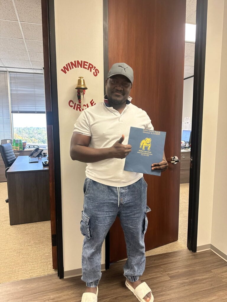 Client celebrating justice after car accident in Houston