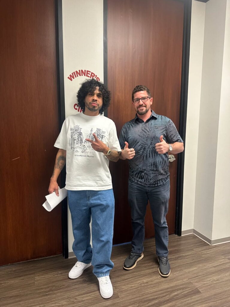 Personal injury client celebrating outcome with legal team