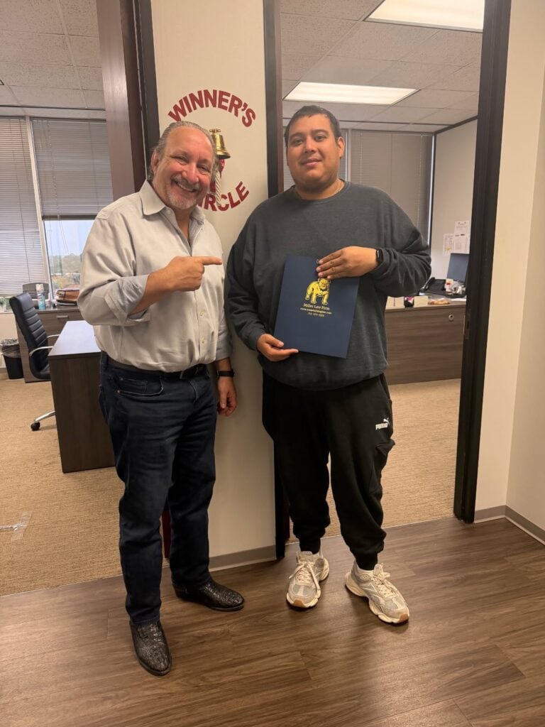 Client celebrating case win at trusted Houston law firm