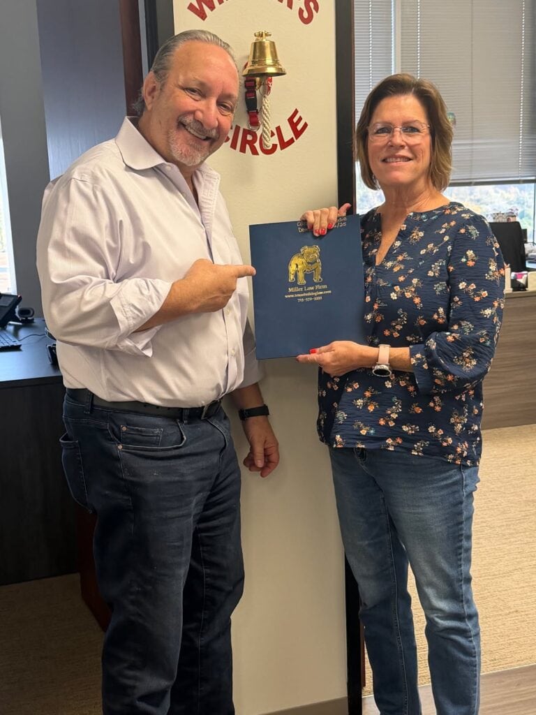 Client ringing bell after successful Houston injury claim