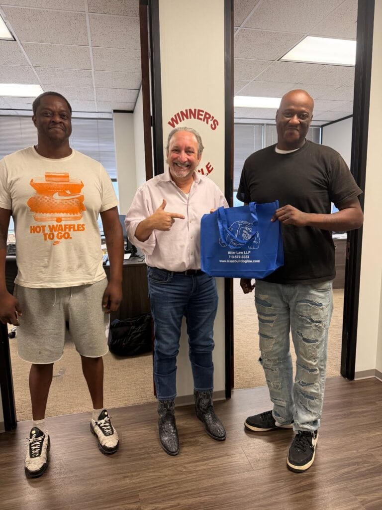 Client celebrating legal success at Houston injury law firm