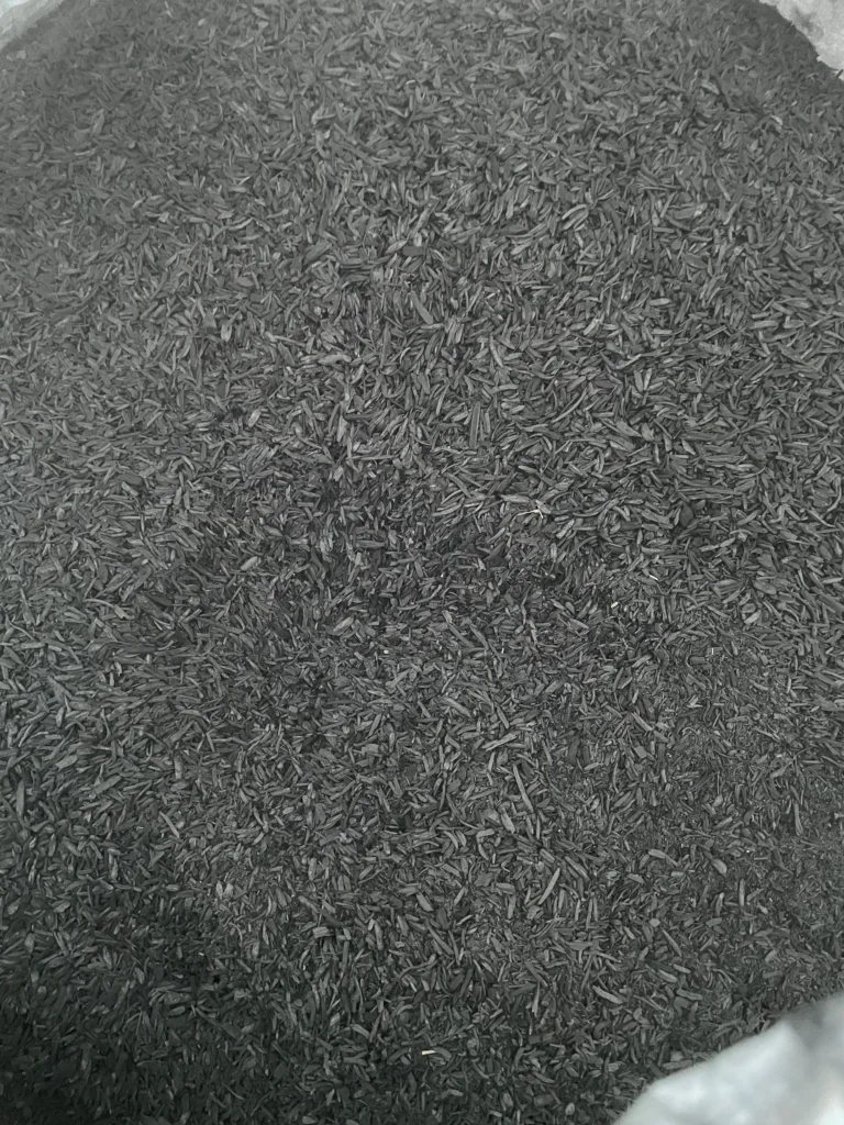 A pile of small granulate biochar.