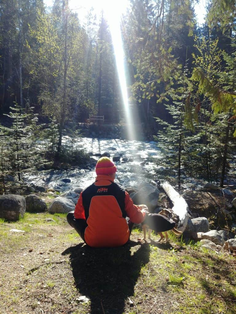 MissVelocity and dog sitting and enjoying the Kokanee Creek