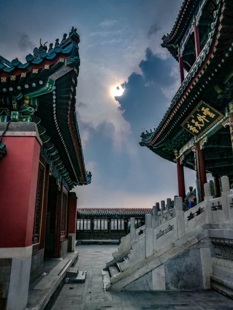 Sun shining through clouds summer palace