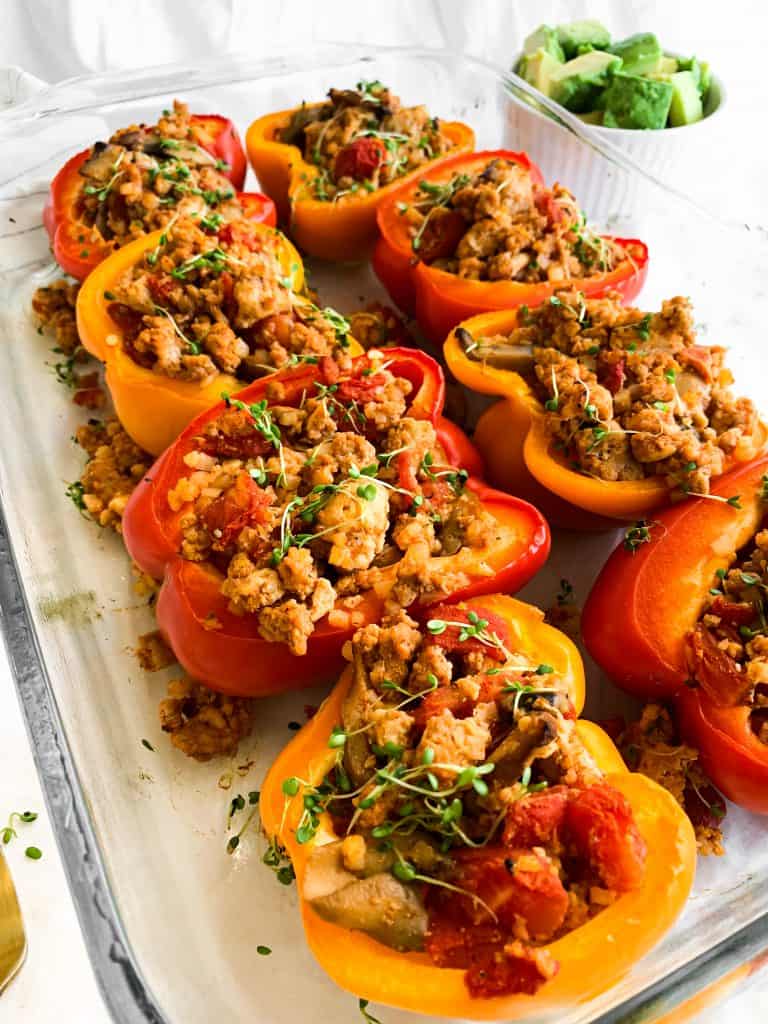 Healthy Stuffed Peppers with ground turkey, mushrooms, tomatoes, and spices. Whole30 approved.