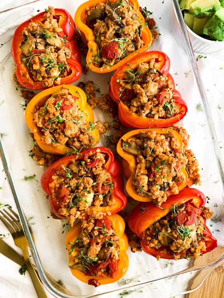 Whole30 Stuffed Peppers with ground turkey, mushrooms, tomatoes, and spices.